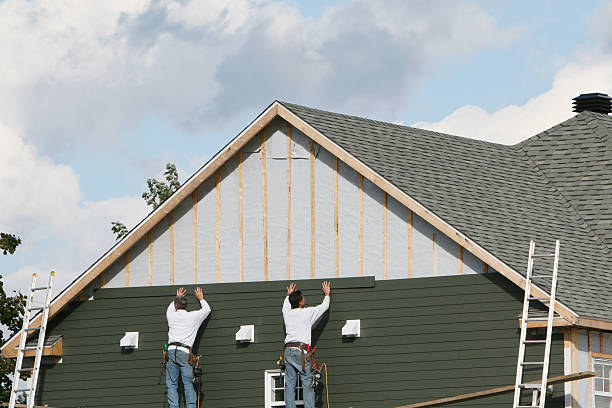 Professional Storm Damage Siding Repair technician working in Bridgewater, VA